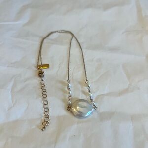 Rafia necklace with faux pearl